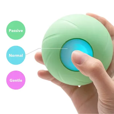 Groene bal met drie modi: passief, normaal en zacht. Vinger drukt op verlicht blauw gebied om modus te kiezen.