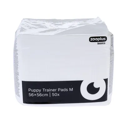 zooplus basics Puppy Trainer Pads M, 56×56 cm, 50 unités, emballage visible avec texte en anglais sur le devant