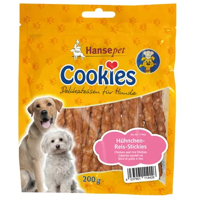 Hansepet Cookies Delikatessen für Hunde, Hühnchen-Reis-Stickies, 200 g. Gâteries poulet-riz pour chiens, sachet transparent montrant les sticks à l’intérieur.