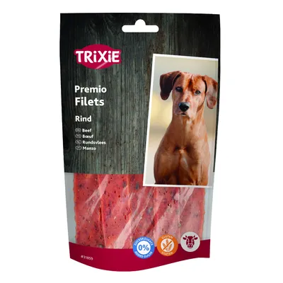 Trixie Premio Filets Rind. Bez dodatku cukru, bezglutenowe. Opakowanie z widocznymi kawałkami polędwicy wołowej i symbolami jakości oraz składników.