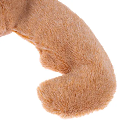 Närbild av ett brunt, plyschigt leksak med mjuk yta.
