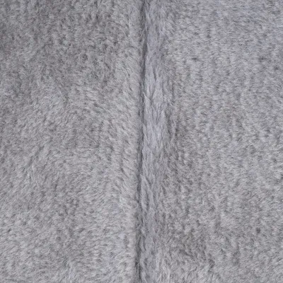 Close-up of grey, soft fabric with fluffy texture.