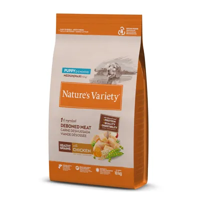 Sac Nature's Variety Puppy 2–12 months Medium/Maxi, viande désossée, céréales complètes, poulet, 10 kg. Texte visible : protéines, qualité, digestibilité. Illustration de chien.