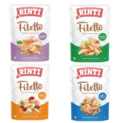 Quatre sachets Rinti Filetto Feines Huhnfilet 100g : avec jambon, légumes, cœur ou canard en gelée. Texte en allemand visible sur chaque emballage.