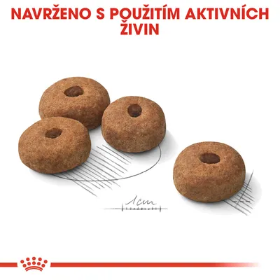 Čtyři kulaté granule s otvorem uprostřed, měřítko 1 cm. Text: NAVRŽENO S POUŽITÍM AKTIVNÍCH ŽIVIN.