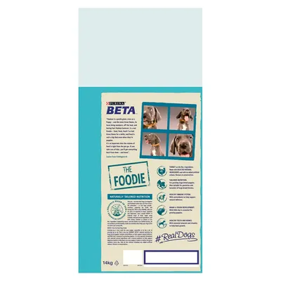 Back of pet food bag showing product features, nutrition information, ingredient highlights, feeding benefits, and images of a dog. Text includes 'The Foodie' and '#RealDogs'.