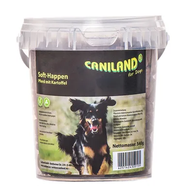 Secchiello Caniland for Dogs Soft-Happen Pferd mit Kartoffel, peso netto 540 g, immagine di cane nero e marrone sulla confezione. Testo in tedesco visibile sull'etichetta.