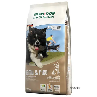 BEWI DOG lamb & rice torrfoder för hund, 12,5 kg. Text: enthält Leinsaat als Quelle von Omega-3, für sensitive adult dogs. Illustration av springande hund på förpackningen.