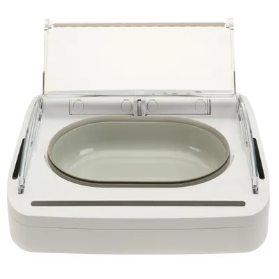 Automatic pet feeder with a transparent lid and removable oval food bowl, shown open and ready for use.