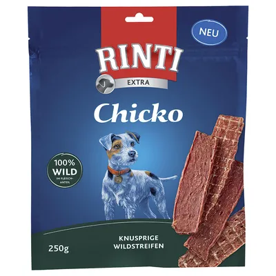 RINTI Extra Chicko, 100% Wild im Fleischanteil, knusprige Wildstreifen, 250 g. Na obalu je vyobrazen pes a proužky sušeného masa. Text 'NEU' v pravém horním rohu.