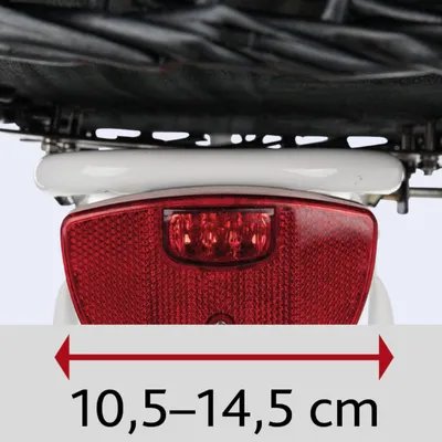 Largeur indiquée sous un porte-bagages de vélo avec flèche rouge et texte : 10,5–14,5 cm