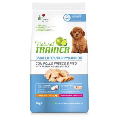 Natural Trainer Small & Toy Puppy & Junior hondenvoer, met verse kip en rijst, 2 kg. Zonder kleurstoffen, conserveermiddelen of toegevoegde suikers. Made in Italy staat zichtbaar op de verpakking.