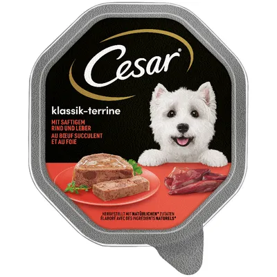 Cesar klassik-terrine, mit saftigem rind und leber, au bœuf succulent et au foie. Tray with sliced meat terrine and raw meat pieces shown on label. Text in German and French.