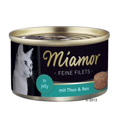 Boîte Miamor Feine Filets, In Jelly, mit Thun & Reis. Image d’un chat blanc et d’un médaillon de filet visible sur l’étiquette. Texte en allemand.