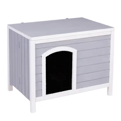 Niche rectangulaire en bois gris avec entrée voûtée, contours blancs, sans marque visible. Toit plat et panneaux à lattes horizontales.