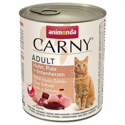 Консерва Animonda Carny Adult для кошек, Huhn, Pute + Entenherzen. 100% frische Zutaten, Ohne Getreide, Made in Germany. Изображены кусочки мяса и кот.