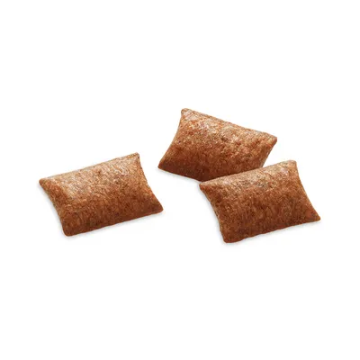 Drei braune, kissenförmige Snacks mit glatter Oberfläche, sichtbar als Einzelstücke.