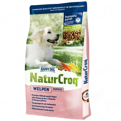 Happy Dog NaturCroq Welpen Puppies kutyatáp csomagolás, látható: fehér kölyökkutya, sárgarépa, gabona, felirat: Ohne Soja, Farb- & Konservierungsstoffe!