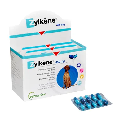 Zylkène 450 mg, karma uzupełniająca dla psów, opakowanie z wizerunkiem psa i blistrem 10 niebieskich kapsułek. Widoczne logo Vetoquinol.