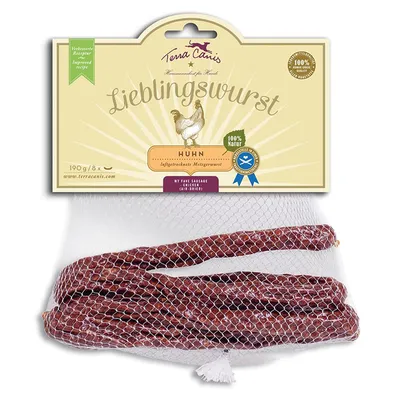 Упаковка Terra Canis Lieblingswurst Huhn, 190 г, 8 штук. Видны колбаски в сетке, надписи: 100% Natur, Improved recipe, My fave sausage chicken (air-dried).