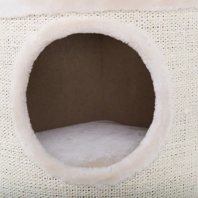 Cuccia per animali con ingresso circolare, rivestimento esterno in tessuto chiaro e interno imbottito morbido visibile.