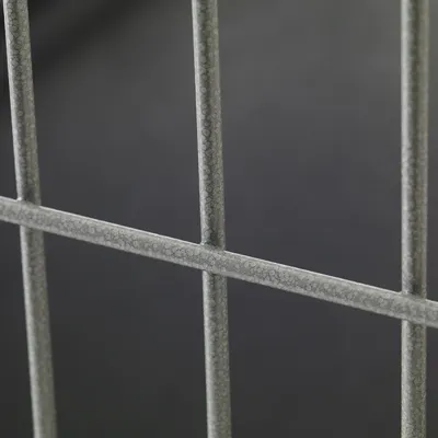 Close-up of metal grid bars showing material texture and construction detail.