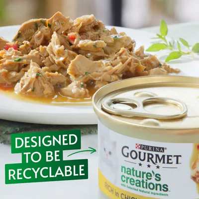 Purina Gourmet Nature's Creations cat food tin, rich in chicken, with shredded food on plate. Text: Designed to be recyclable.