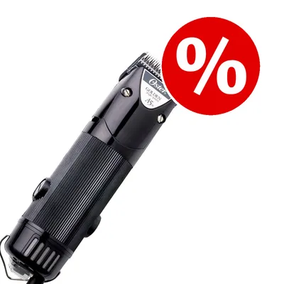 Máquina cortapelos Oster Golden A5 negra con símbolo de porcentaje en círculo rojo, indicando posible oferta o descuento visible en la imagen.