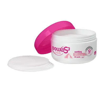 Open tub of Douxo S3 Calm soothing pads for itchy, irritated skin, showing 30 pads with some removed and stacked beside the container.