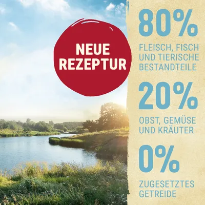 NEUE REZEPTUR. 80 % FLEISCH, FISCH UND TIERISCHE BESTANDTEILE, 20 % OBST, GEMÜSE UND KRÄUTER, 0 % ZUGESETZTES GETREIDE. Teksti saksaksi.
