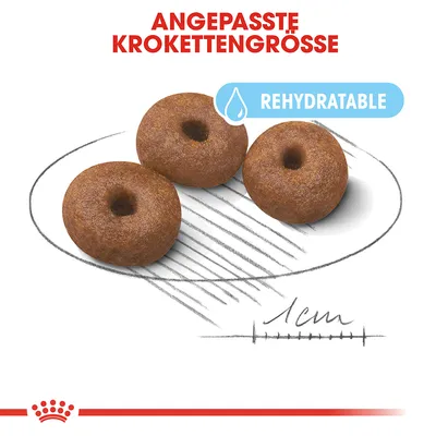 Tre torrfoderbitar, text: 'Angepasste Krokettengrösse', blå etikett med 'Rehydratable', storleksangivelse 1 cm. Text på tyska och engelska.