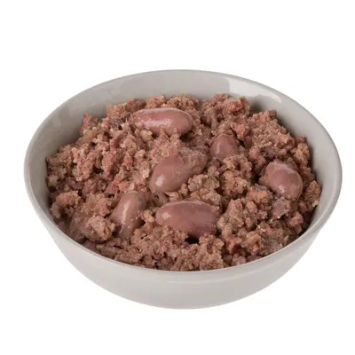 Bowl with moist pet food, consisting of brown meat pieces and several larger pieces in a grey ceramic bowl.