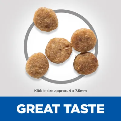 Five round kibbles shown with text stating kibble size approximately 4 by 7.5 millimetres and the phrase great taste.