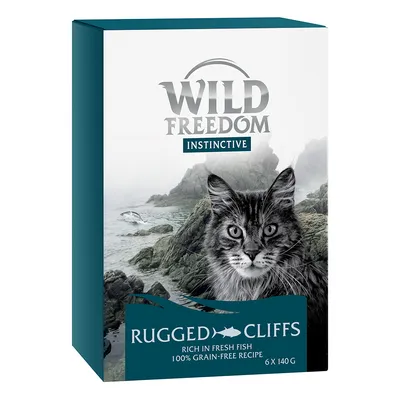 Wild Freedom Instinctive Rugged Cliffs kattemad, rich in fresh fish, 100% grain-free recipe, 6 x 140 g. Billede af kat foran klipper og hav.