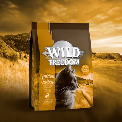 Pachet hrană pentru pisici Wild Freedom Golden Valley, text vizibil: 100% grain-free recipe, Inspired by your cat's natural instincts, Lots of fresh poultry meat with rabbit.