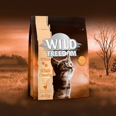 Wild Freedom Kitten Wide Country, 100% grain-free recipe, lots of fresh poultry meat, 400g. Inspired by your cat’s natural instincts. Image shows a kitten on the packaging.