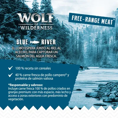 WOLF of WILDERNESS BLUE RIVER. 100 % receta sin cereales, 40 % carne fresca de pollo campero y proteína de salmón valiosa. Free-range meat. Texto en español e inglés.