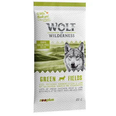Opakowanie Wolf of Wilderness Green Fields, 100 g, widoczne napisy: 100% grain-free recipe, lots of fresh chicken meat & lamb, zooplus. Tekst w języku angielskim i niemieckim.
