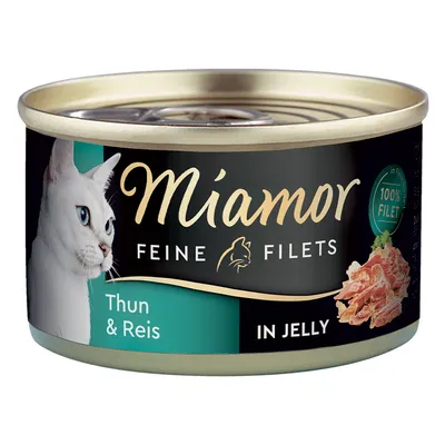 Miamor Feine Filets риба тон и ориз в желе, 100% филе. Котешка храна в консерва с изображение на бяла котка и парчета риба тон.