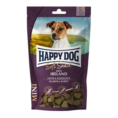 Sachet de friandises Happy Dog Soft Snack Mini Ireland, saumon & lapin. Texte visible : sans céréales, sans sucre ajouté, pour peau et pelage. Chien illustré sur l’emballage.
