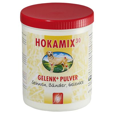 Банка с красной крышкой, надпись HOKAMIX 30 GELENK+ PULVER, Sehnen, Bänder, Gelenke. Изображение собаки на фоне природы. Видна часть состава и информации сбоку.