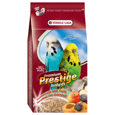 Опаковка Versele-Laga Premium Prestige Budgies със снимки на две вълнисти папагалчета, смес от семена и плодове. Видим текст: Enriched with VAM, Fruits, Florastimul, Chia, Oystershells.