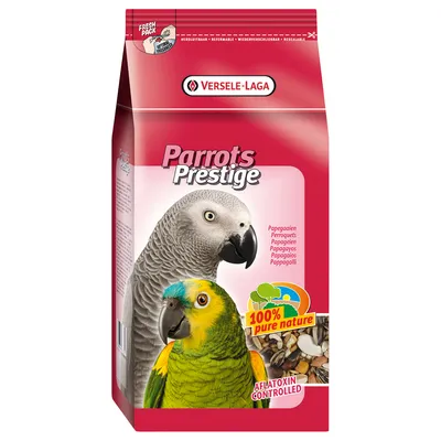 Корм для попугаев Versele-Laga Parrots Prestige, надписи: 100% pure nature, aflatoxin controlled. На упаковке изображены два попугая и смесь семян. Корм для попугаев Versele-Laga Parrots Prestige, надписи: 100% pure nature, aflatoxin controlled. На упаковке изображены два попугая и смесь семян.