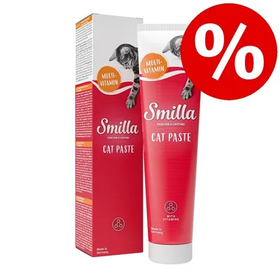 Smilla Cat Paste мултивитамин, туба и кутия с изображение на котка. Надпис: Made in Germany, with vitamins. Червен кръг с бял процентен знак за промоция.