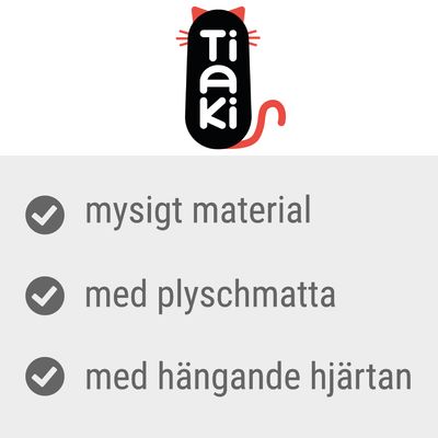 Tiaki. Mysigt material, med plyschmatta, med hängande hjärtan.