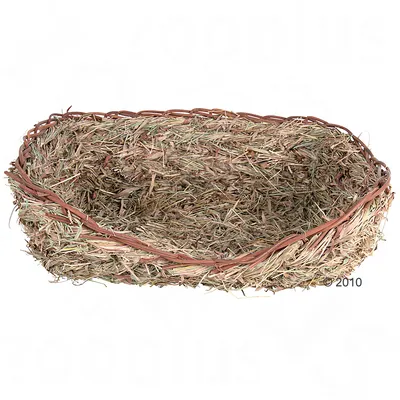 Panier ovale en foin tressé, bords surélevés, sans marque visible. Matériau : foin naturel et branches entrelacées.