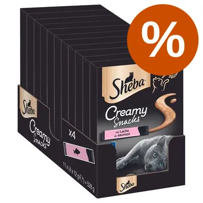 Sheba Creamy Snacks med lax, förpackning med 11 x 4 x 12 g = 528 g. Stor orange procent-symbol synlig på bilden.