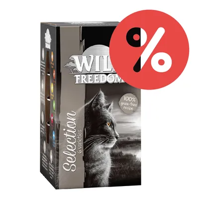 Confezione Wild Freedom Selection 6 varieties, testo visibile: 100% grain-free recipe, simbolo percentuale rosso in alto a destra. Confezione Wild Freedom Selection 6 varieties, testo visibile: 100% grain-free recipe, simbolo percentuale rosso in alto a destra.