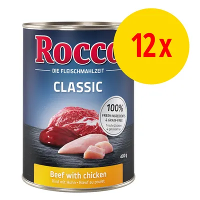 Rocco Classic Beef with chicken, 400 g konzerva, 100% fresh ingredients & grain-free, balení 12×. Viditelné kusy hovězího a kuřecího masa na etiketě.