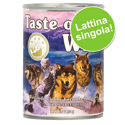 Taste of the Wild Wetlands Canine Formula-in Gravy, lattina singola, 374 g. Testo visibile: A grain-free diet, Net wt. 13.2 oz (374 g). Immagine di lupi e paesaggio naturale.